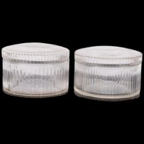 A pair of cut-glass circular storage boxes, with lids, diameter 20cm (2)
