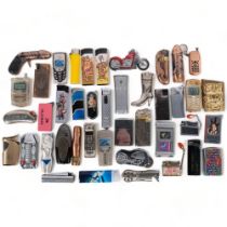 A collection of novelty pocket cigarette lighters, etc