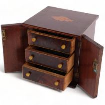 A small Edwardian mahogany and chequered banded table-top collector's chest, the 2 doors opening