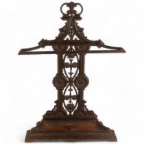 A Victorian architectural design cast-iron stick stand with drip tray, H76cm