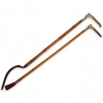 An early 20th century Malacca and similar bamboo-shafted horn-handled riding crops with silver