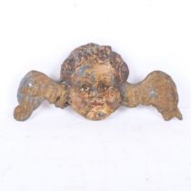 An Antique lead putti, L20cm, quantity of paint present but is flaking