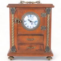 A stained wood jewellery box with an inset quartz movement clock. The hinged door opening to a