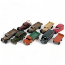 A group of loose Dinky toys, to include a Dodge tipping wagon, several flat bottom trucks and