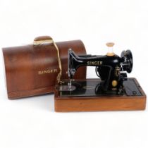 Vintage Singer electric sewing machine, with wooden carrying case