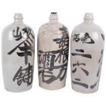 3 ceramic Japanese Sake bottles with inscriptions, 35.5cm