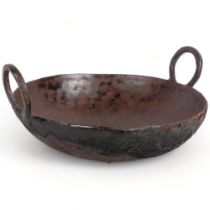 A large Vintage cast-iron 2-handled wok, 45cm across overall
