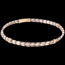 A yellow metal and elephant hair woven bangle, 2.6g