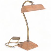 A brass swan-neck student's desk lamp, with ceramic shade and base, H35cm