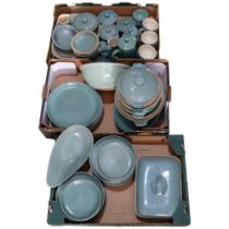 A large quantity of green Denby stoneware dinnerware, including casserole dishes, plates, hot