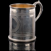 A Victorian silver christening mug, Robert Harper, London 1870, tapered cylindrical form, with