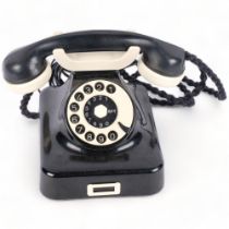 A Vintage RFT black and cream plastic dial telephone