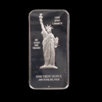 A New Millennium Group one troy ounce .999 fine silver proof ingot, Franklin Mint, serial no.