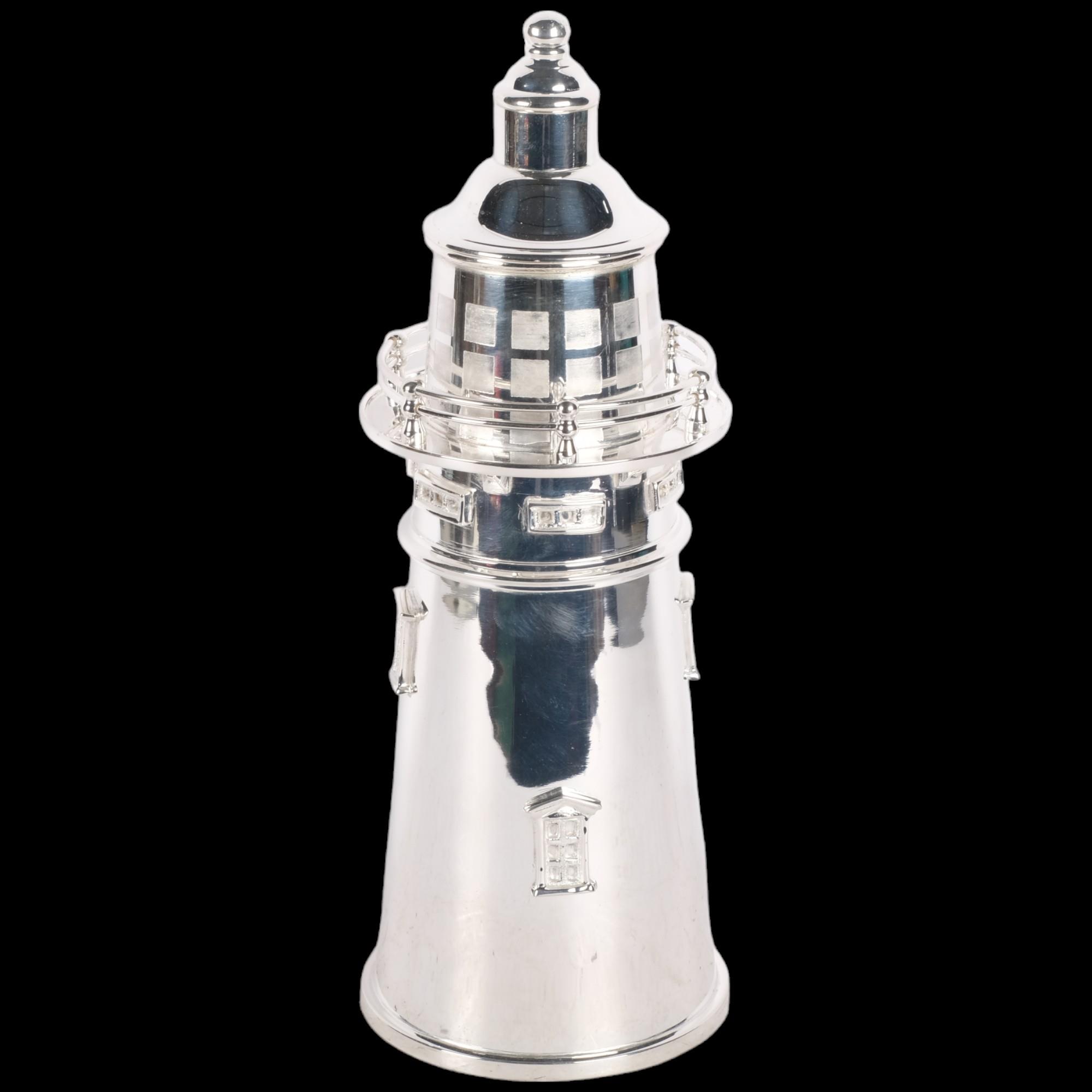 A silver plated modern lighthouse design cocktail shaker, H34cm
