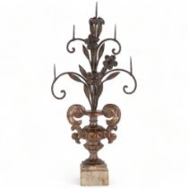 A carved painted wood and scrolled wrought-iron 4-branch candle stand, H66cm