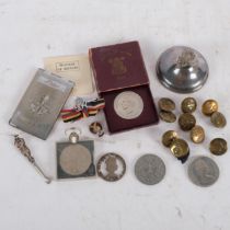 A quantity of interesting items, to include various commemorative coins, military buttons, a