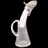 A glass oil jug with plated fish head design lid, H24cm