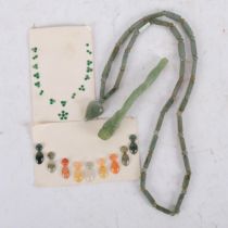 A jade necklace, with heart-shaped pendant, L80cm, and a jade carved dragon pipe, and a selection of