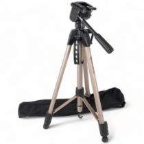 A First video/photo tripod, model T50/C3750, in original packaging with associated carry case