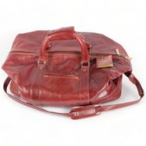 Jacob Fine Leather, a large burgundy leather weekend bag, with original label, bag length approx