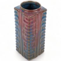 A square Oriental stoneware vase, with blue and red glaze, 23cm