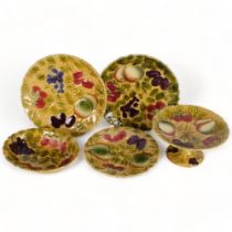 Sarreguenines, a quantity of hand painted plates, 2 comports, and a shallow dish (5)