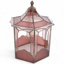 A pink coloured leadlight octagonal terrarium with brass pineapple finial, H41cm, W30cm Generally