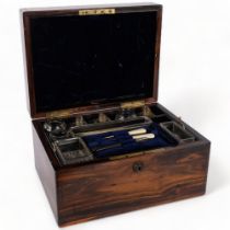 An Asprey and S Mordan & Company Victorian coromandel and brass-bound travelling vanity box,