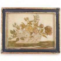 A Victorian embroidered stumpwork still life study, basket of flowers, 29cm x 38cm overall, framed