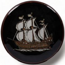 A Japanese embossed and glazed stoneware study of a galleon, 34cm, in lidded pine box