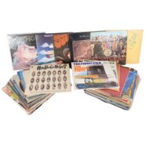 A quantity of vinyl LPs, including such artists as Joni Mitchell, Fleetwood Mac, The Beatles, The