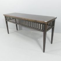 WILLIAM YEOWARD - A contemporary ebonised Lennox console table. 153x69x36cm