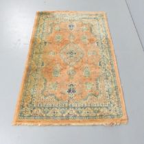 A cream ground Oushak rug. 150x94cm.