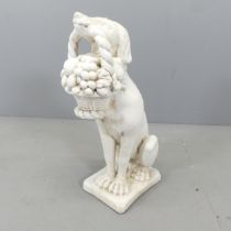 A painted stone garden statue, study of a dog holding fruit basket. Height 60cm.