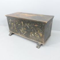 An antique eastern European oak coffer with folk-art painted decoration. 124x61x60cm.