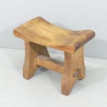An Arts & Crafts teak stool by R B Richards & Sons, Castle Foregate Saw Mills, Shrewsbury, with
