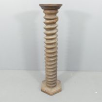A French elm spiral turned column on hexagonal base. 33x128cm. Diameter of top of pedestal 28cm.