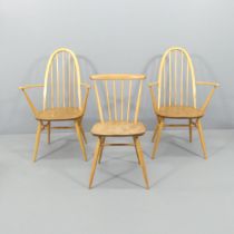 A pair of Ercol Quaker carver chairs, and a stickback dining chair. (3).