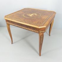 An Italian Notturno Sorrento marquetry games compendium table with chess, backgammon, card and