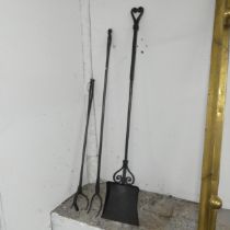 A set of wrought iron fire tools. Longest 120cm.