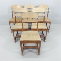 A set of six mid-century design school chairs in the manner of American Seating. Used condition,
