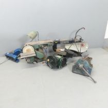 A Power Craft PFZ400R scroll saw, a Ferm belt sander, a Parkside wet and dry grinder, a Clark Strong
