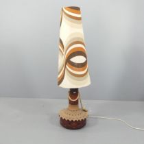 A mid-century West German pottery floor lamp with original shade. Height overall 134cm. Impressed