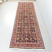 A red and blue ground Hamadan runner. 330x100cm