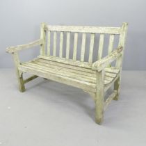LISTER - A weathered teak slatted garden bench. Overall 121x85x68cm. With maker's label.