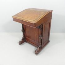 An antique mahogany Davenport. 59x81x59cm. Generally good used condition. Skiver is very marked.