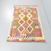 A Chobi Kilim rug. 177x112cm.