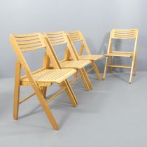 A set of four Scandinavian mid-century style bent ply folding chairs.