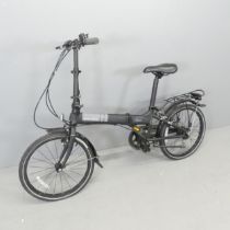 A Dahon Vitesse five speed folding bicycle.
