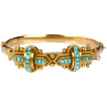 A Victorian 15ct gold Etruscan Revival turquoise hinged bangle, circa 1880, the central double cross